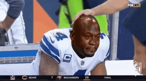 A Football Player With The Number 44 On His Jersey Is Crying GIF