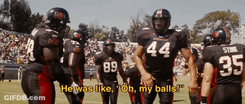 A Football Player With The Number 44 On His Jersey Stands On The Field GIF