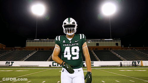 A Football Player With The Number 49 On His Uniform GIF