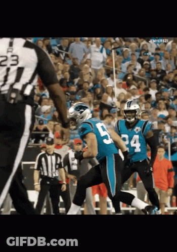 A Football Player With The Number 5 On His Jersey Runs Towards A Referee GIF