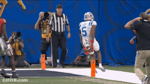 A Football Player With The Number 5 On His Shirt GIF
