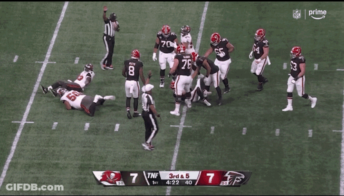 A Football Player With The Number 50 On His Helmet GIF