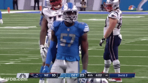 A Football Player With The Number 57 On Their Jersey GIF