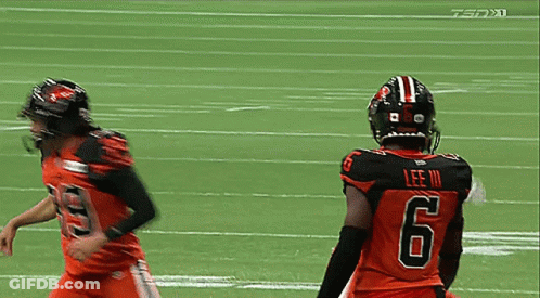 A Football Player With The Number 6 On His Back Is Running On The Field GIF