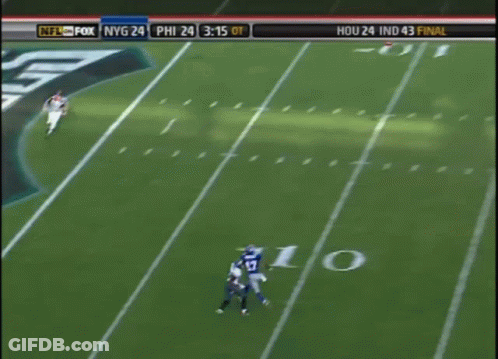 A Football Player With The Number 7 On His Jersey Is Standing Next To A Referee GIF
