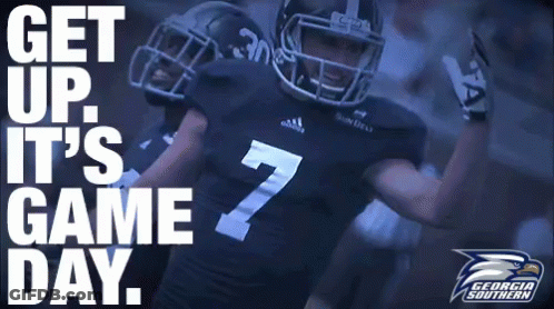 A Football Player With The Number 7 On His Jersey Stands In Front Of A Sign That Says Get Up It 'S Game Day GIF