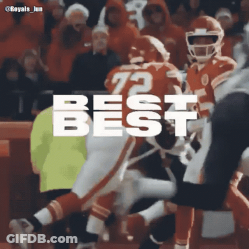 A Football Player With The Number 72 On His Jersey Is Running With The Ball GIF