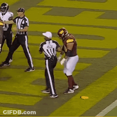 A Football Player With The Number 78 On His Jersey Stands On The Field GIF