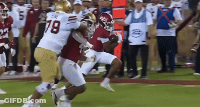 A Football Player With The Number 79 On Their Jersey GIF