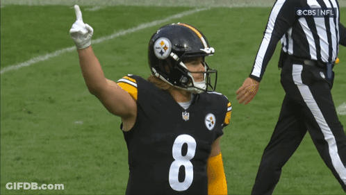 A Football Player With The Number 8 On His Jersey Is Giving A Thumbs Up GIF