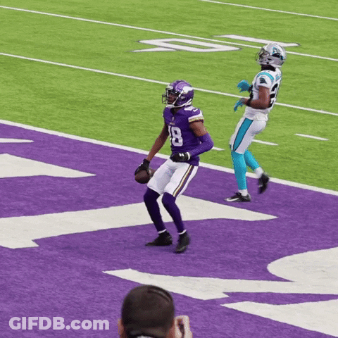 A Football Player With The Number 8 On His Jersey Is On The Field GIF