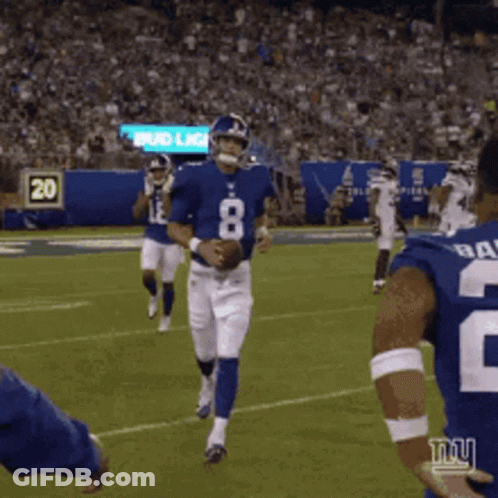 A Football Player With The Number 8 On His Jersey Runs With The Ball GIF