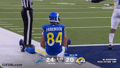 A Football Player With The Number 84 On His Back GIF