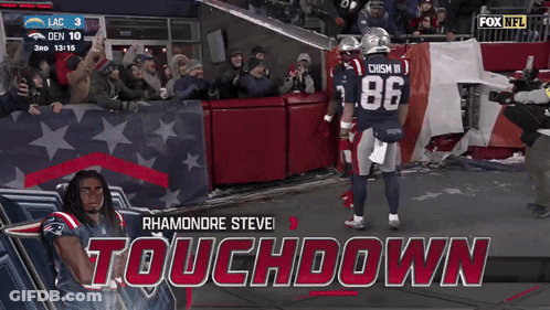 A Football Player With The Number 86 On His Jersey Walks On The Field GIF