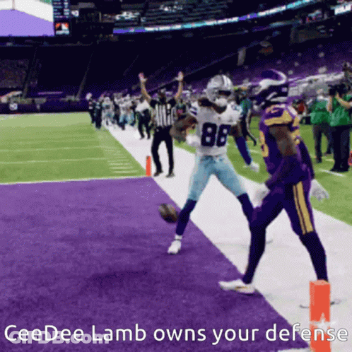A Football Player With The Number 88 On His Jersey Kicks The Ball GIF