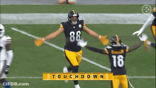 A Football Player With The Number 88 On His Jersey Runs On The Field GIF