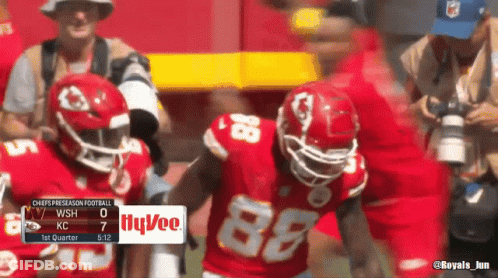 A Football Player With The Number 88 On His Jersey Stands On The Field GIF