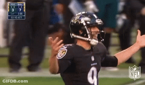 A Football Player With The Number 9 On His Jersey Is Giving A Thumbs Up . GIF