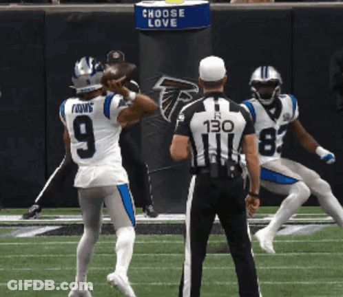 A Football Player With The Number 9 On His Jersey Throws The Ball GIF