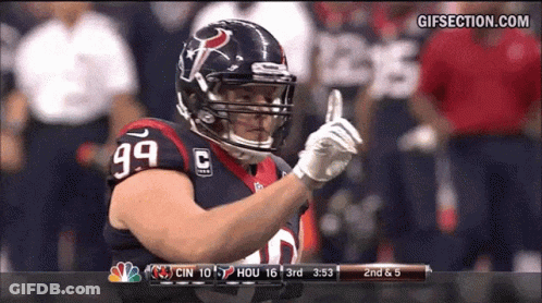 A Football Player With The Number 99 On His Jersey Is Giving A Thumbs Up GIF
