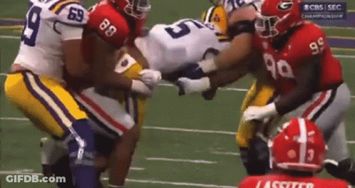 A Football Player With The Number 99 On His Shirt GIF
