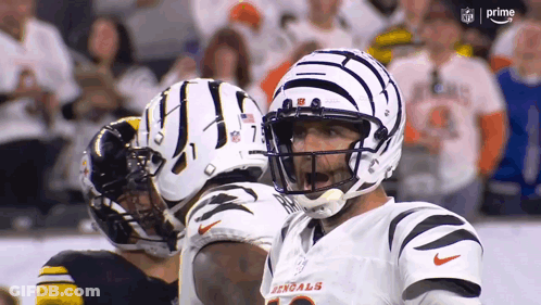 A Football Player With The Word Bengals On His Shirt GIF