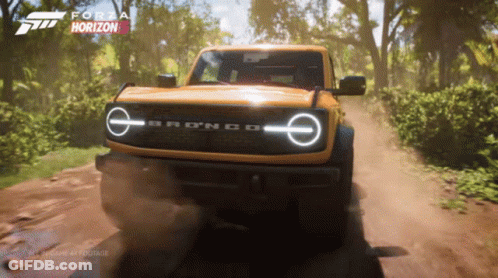 A Ford Bronco Is Driving Down A Dirt Road In A Video Game GIF