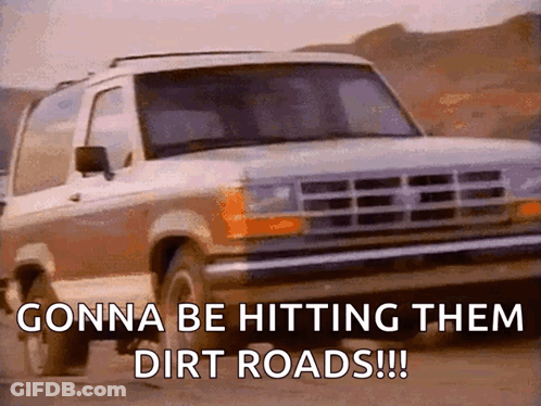 A Ford Bronco Is Driving Down A Dirt Road With The Caption " Gonna Be Hitting Them Dirt Roads !!! " GIF