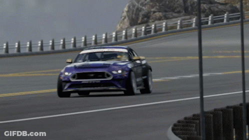A Ford Mustang Is Driving Down A Road In A Video Game GIF