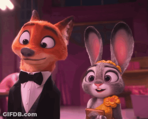 A Fox And A Rabbit Are Standing Next To Each Other And Smiling GIF