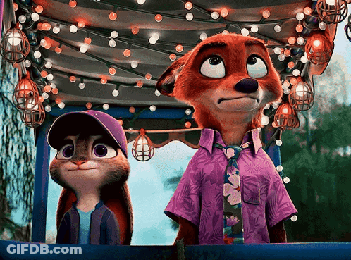 A Fox And A Rabbit Are Standing Next To Each Other Under A Canopy Of Lights GIF
