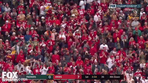 A Fox Deportes Broadcast Of A Football Game Between The Packers And The 49Ers GIF