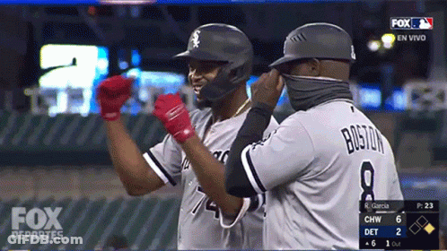 A Fox Deportes Broadcast Shows Two Baseball Players Celebrating GIF