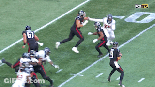 A Fox NFL Football Game Is Being Played On A Field GIF