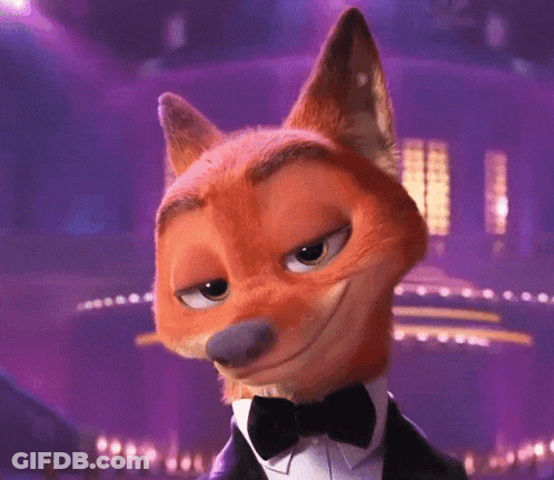 A Fox Wearing A Tuxedo And Bow Tie GIF