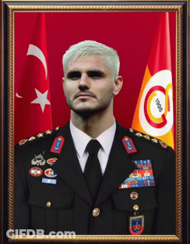 A Framed Portrait Of A Man In A Military Uniform With The Year 1905 On The Flag Behind Him GIF