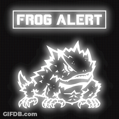 A Frog Is Glowing In The Dark Under A Sign That Says " Frog Alert " GIF