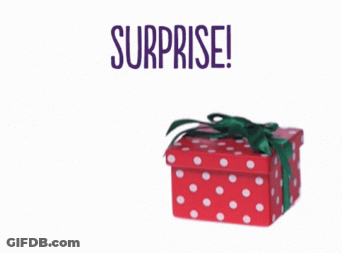 A Frog Is Peeking Out Of A Red Polka Dot Gift Box With The Words Surprise Written Above It GIF