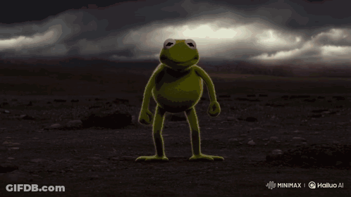 A Frog Is Standing In The Middle Of A Desert With Red Flames Coming Out Of Its Arms And Legs . GIF
