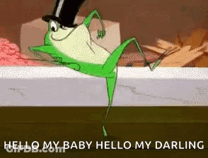 A Frog Wearing A Top Hat Is Dancing On A Bed . GIF