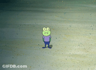 A Frog With Big Eyes And A Purple Shirt Is Standing On A Sandy Beach GIF
