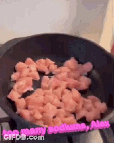 A Frying Pan Filled With Chopped Chicken And The Words " Too Many Sodium Alex " GIF