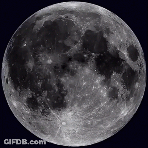 A Full Moon Against A Dark Sky With A Few Clouds GIF