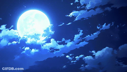 A Full Moon In A Cloudy Blue Sky GIF