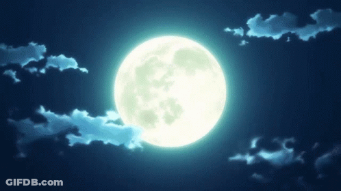 A Full Moon Is Shining Brightly In A Dark Blue Sky GIF