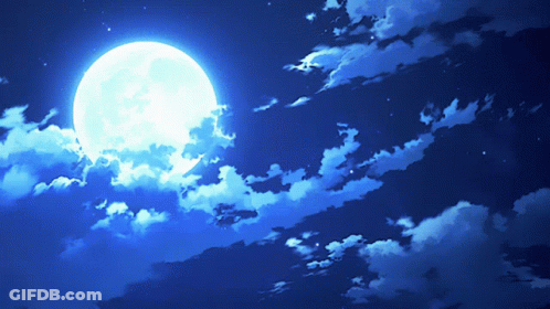 A Full Moon Shines Brightly In A Dark Blue Sky GIF