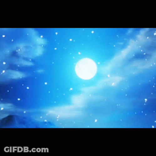 A Full Moon Shines Brightly In The Night Sky GIF