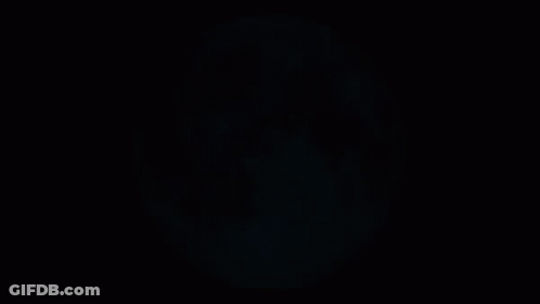 A Full Moon With A Black Background Is Shown GIF