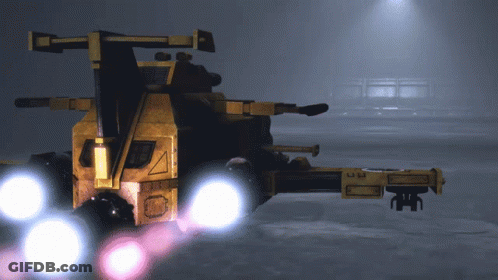 A Futuristic Looking Vehicle With A Triangle On The Side Of It GIF
