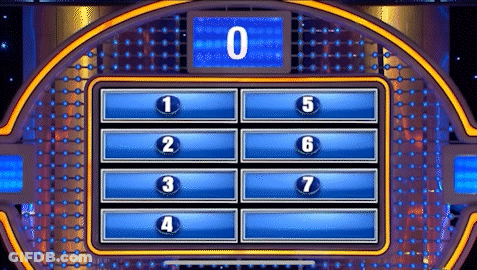 A Game Show Is Being Played On A Stage With A Scoreboard That Says 0 On It . GIF